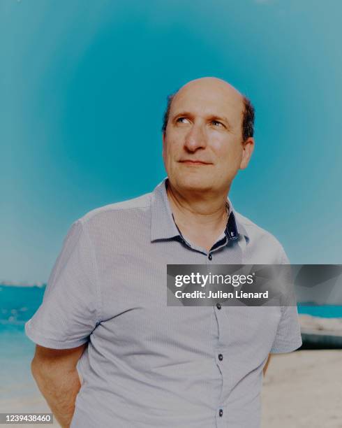 Filmmaker Jean-Marie Gigon poses for a portrait on July 7, 2021 in Cannes, France.