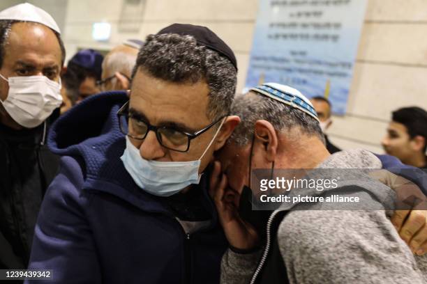 March 2022, Israel, Beersheba: Mourners attend the funeral of Menahen Ehezkel in Beersheba after he was killed a day earlier in a terror attack along...