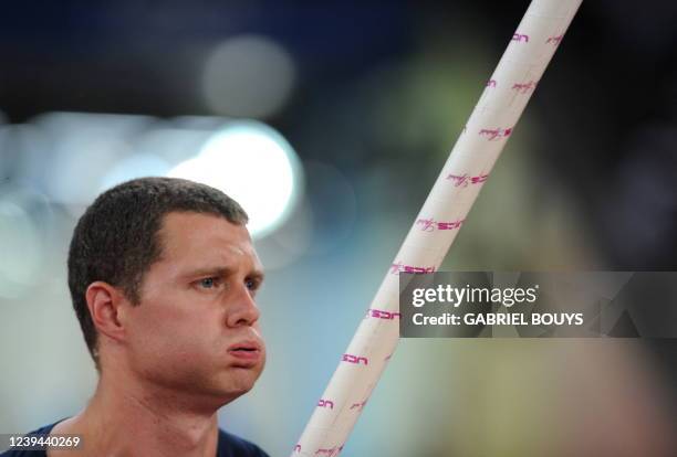 Athlete Brad Walker warms up during the men's Pole vault qualifiers at the National stadium as part of the 2008 Beijing Olympic Games on August 20,...