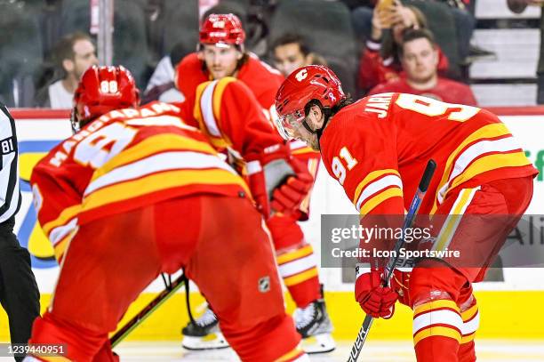 Calgary Flames Center Calle Jarnkrok , Calgary Flames Center Sean Monahan and Calgary Flames Right Wing Blake Coleman get ready for a face-off during...