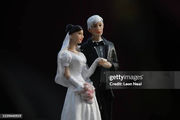 Wedding cake is displayed by supporters of WikiLeaks founder Julian Assange as they gather at Belmarsh Prison where he married partner Stella Moris...