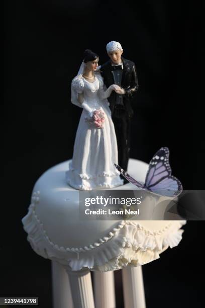 Wedding cake is displayed by supporters of WikiLeaks founder Julian Assange as they gather at Belmarsh Prison where he married partner Stella Moris...