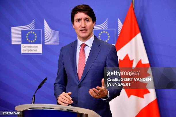Canada's Prime Minister Justin Trudeau delivers a statement after a meeting with European Commission President at the EU headquarters in Brussels, on...