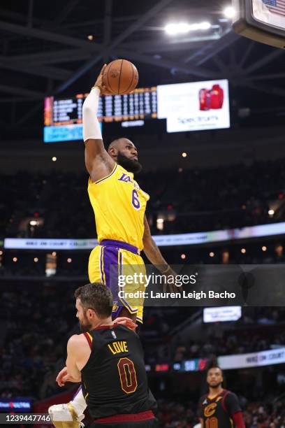 LeBron James of the Los Angeles Lakers dunks the ball during the game against the Cleveland Cavaliers on March 21, 2022 at Rocket Mortgage FieldHouse...