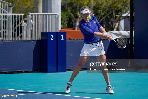 Anna-Lena Friedsam hits a shot during qualifying round of the Miami Open on March 21, 2022 at Hard Rock Stadium in Miami Gardens, FL.