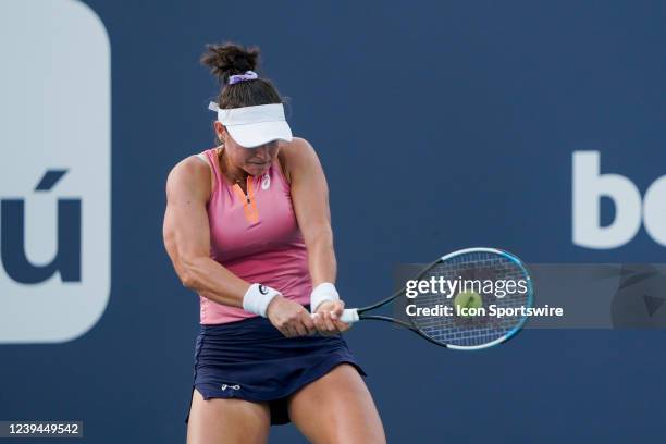 Caroline Dolehide hits a shot during qualifying round of the Miami Open on March 21, 2022 at Hard Rock Stadium in Miami Gardens, FL.