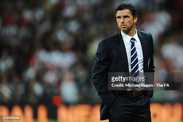 Gary Speed the Wales manager watches from the touchline during the UEFA EURO 2012 group G qualifying match between England and Wales at Wembley...