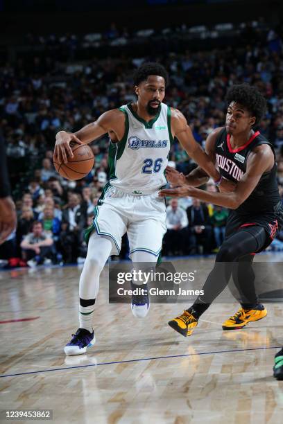 Spencer Dinwiddie of the Dallas Mavericks dribbles the ball during the game against the Houston Rockets on March 23, 2022 at the American Airlines...