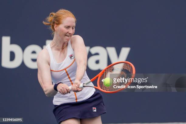 Alison Van Uytvanck hits a shot during qualifying round of the Miami Open on March 22, 2022 at Hard Rock Stadium in Miami Gardens, FL.