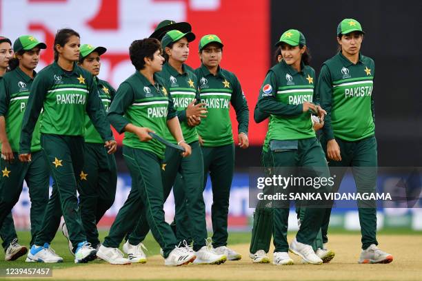 Pakistan team leaves the field after losing the Women's Cricket World Cup match between England and Pakistan at Hagley Oval in Christchurch on March...