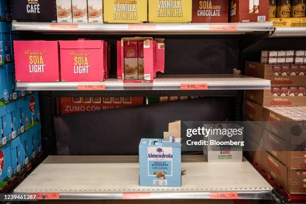 Near-empty shelves in the dairy alternatives section inside a supermarket in Barcelona, Spain, on Wednesday, March 23, 2022. The euro-area economy is...