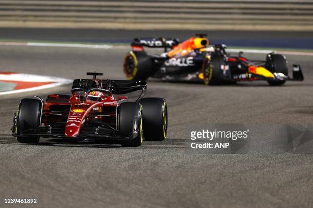 Charles Leclerc driving the Ferrari, Max Verstappen driving the Oracle Red Bull Racing RB18 Honda on track during the Bahrain F1 Grand Prix at the...