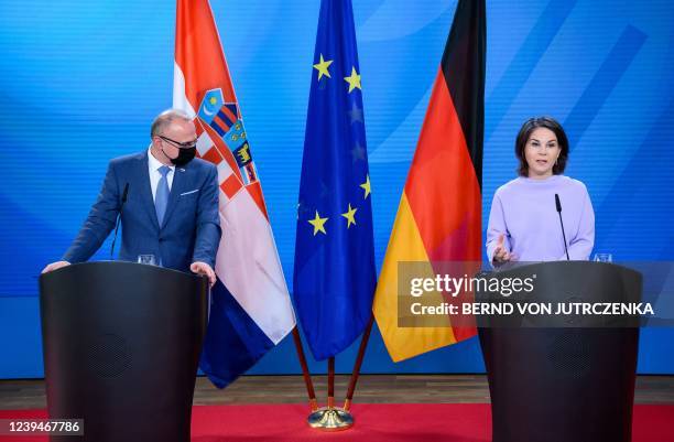 German Foreign Minister Annalena Baerbock and Croatian Foreign Minister Gordan Grlic-Radman address a joint press conference after talks at the...
