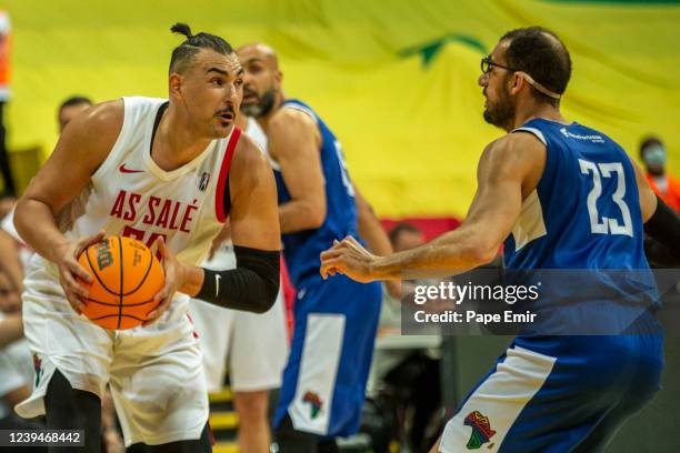 Khalid Boukichou of the AS Salé handles the ball during the game against the Union Sportive Monastirienne on March 11, 2022 at the Dakar Arena. NOTE...