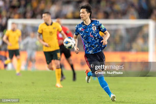 Kou Itakura of Japan controls the ball during FIFA World Cup Qatar 2022 Qualification match between Australia and Japan at Stadium Australia in...