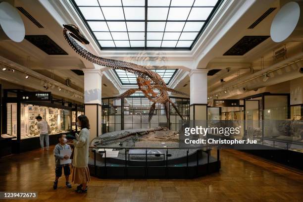 Visitors in protective masks are seen inside the National Museum of Nature and Science on the first day of re-opening after Covid-19 on June 1, 2020...