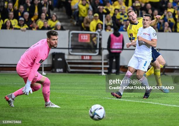 Sweden's midfielder Dejan Kulusevski watches the ball next to Czech Republic's midfielder Tomas Holes during the FIFA World Cup Qualifier football...