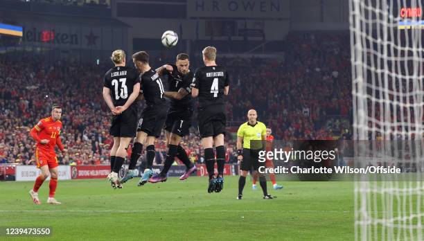 Gareth Bales scores the opening goal for Wales from a free kick during the 2022 FIFA World Cup Qualifier knockout round play-off match between Wales...