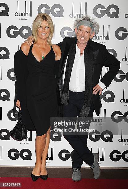 Rolling Stone Keith Richards and wife Patti Hansen attend the GQ Men Of The Year Awards at The Royal Opera House on September 6, 2011 in London,...
