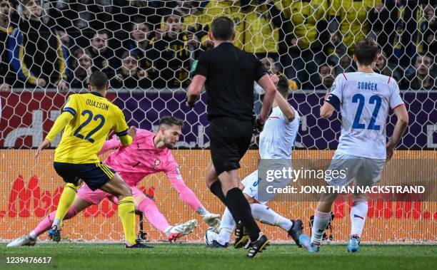 Sweden's forward Robin Quaison scores during the FIFA World Cup Qualifier football match Sweden vs Czech Republic in Solna, on March 24, 2022.