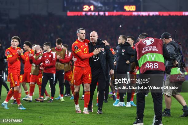Gareth Bale of Wales and manager Robert Page together after their 2-1 victory during the 2022 FIFA World Cup Qualifier knockout round play-off match...
