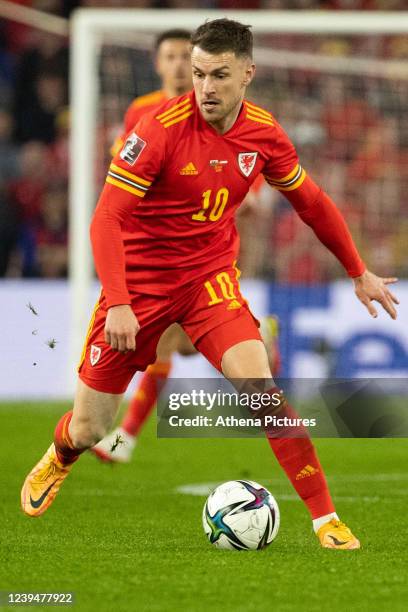 Aaron Ramsey of Wales controls the ball during the 2022 FIFA World Cup Qualifier knockout round play-off match between Wales and Austria at Cardiff...