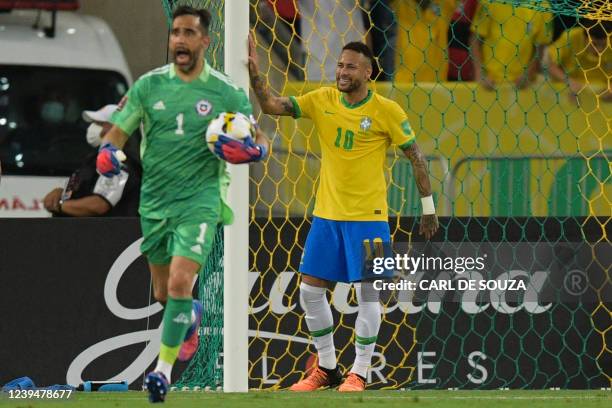 Chile's goalkeeper Claudio Bravo catches a ball kicked by Brazil's Neymar during their South American qualification football match for the FIFA World...