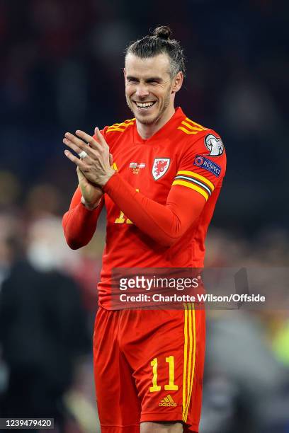 Gareth Bale of Wales celebrates their victory during the 2022 FIFA World Cup Qualifier knockout round play-off match between Wales and Austria at...