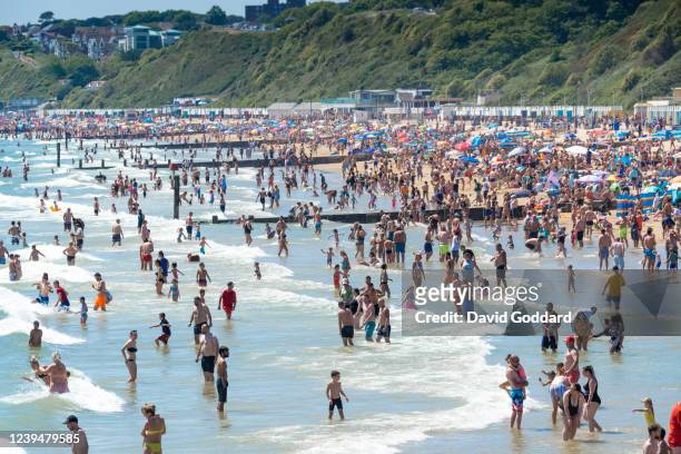 Massive crowds gather on Bournemouth beach making Social distancing very difficult on May 31, 2020 in Bournemouth, England. The British government...
