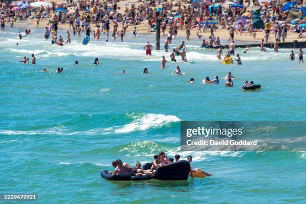 Massive crowds gather on Bournemouth beach making Social distancing very difficult on May 31, 2020 in Bournemouth, England. The British government...