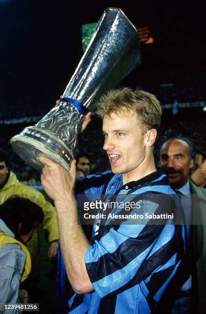Dennis Bergkamp of FC Interanzionale celebrates the victory with the trophy after the Final UEFA Cup 1994 match between Austria Salzburg and FC...