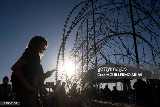 Anastasiia Apenkina 21, an asylum seeker from Ukraine waits with other asylum seeker from her country for US border authorities to allow them in on...