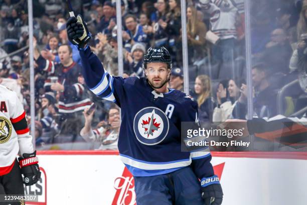 Josh Morrissey of the Winnipeg Jets celebrates his first period goal against the Ottawa Senators at the Canada Life Centre on March 24, 2022 in...