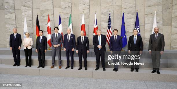 Japanese Prime Minister Fumio Kishida , U.S. President Joe Biden and other leaders of the Group of Seven industrialized nations pose for a group...