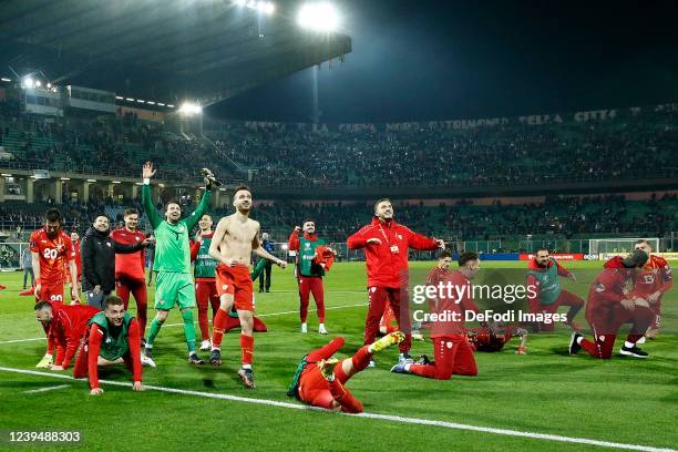 North Macedonia players celebrate after winning the 2022 FIFA World Cup Qualifier knockout round play-off match between Italy and North Macedonia at...