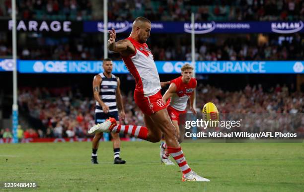 Lance Franklin of the Swans kicks his 1000th during the 2022 AFL Round 02 match between the Sydney Swans and the Geelong Cats at the Sydney Cricket...