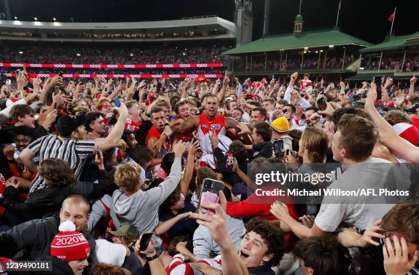 Lance Franklin of the Swans celebrates kicking his 1000th goal during the 2022 AFL Round 02 match between the Sydney Swans and the Geelong Cats at...