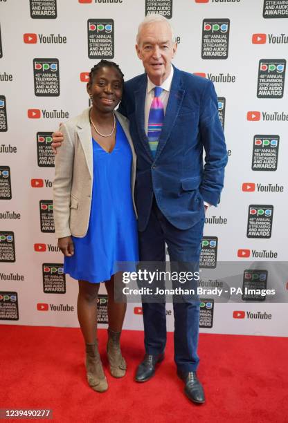 Jon Snow and wife Precious Lunga arrive for the Broadcasting Press Guild Awards at the Brewery, in London. Picture date: Friday March 25, 2022.