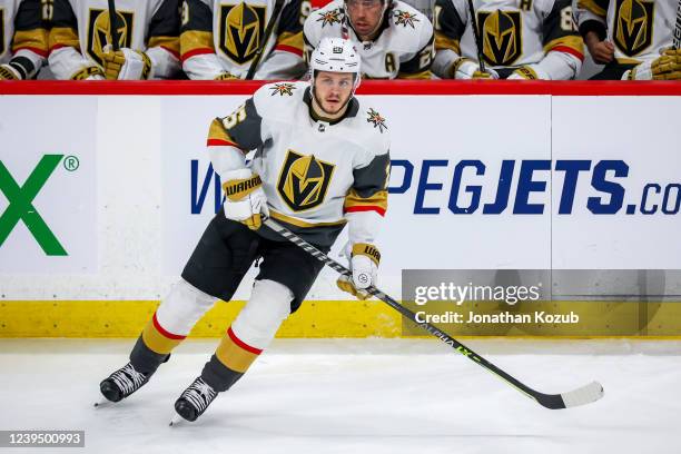 Mattias Janmark of the Vegas Golden Knights keeps an eye on the play during third period action against the Winnipeg Jets at Canada Life Centre on...