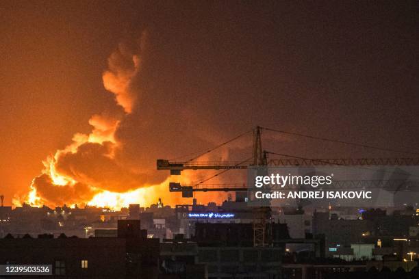 Smoke and flames rise from a Saudi Aramco oil facility in Saudi Arabia's Red Sea coastal city of Jeddah, on March 25 following a reported Yemeni...