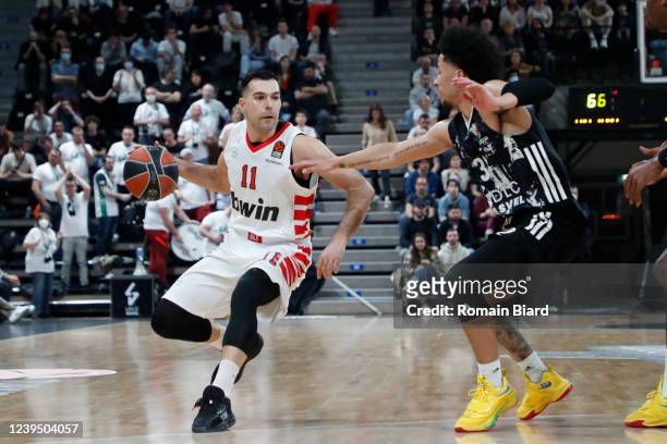 Kostas Sloukas, #11 of Olympiacos Piraeus and Matthew Strazel, #32 of LDLC Asvel Villeurbanne in action during the Turkish Airlines EuroLeague...