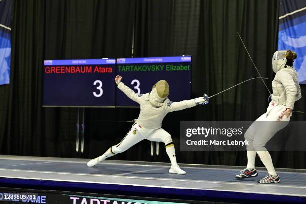 Elizabeth Tartakovsky of the Harvard pilgrims fences against Atara Greenbaum of the Notre Dame Fighting Irish in the Saber finals during the Division...