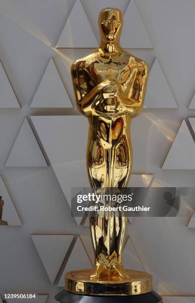 Los Angeles, CA, Friday, March 25 2022 - An Oscar statues shines on the red carpet as construction continues before the 94th Academy Awards show at...