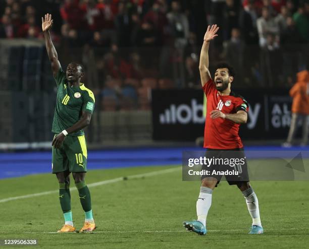 Mohamed Salah of Egypt in action against Sadio Mane of Senegal during FIFA World Cup African Qualifiers 3rd round match between Egypt and Senegal at...