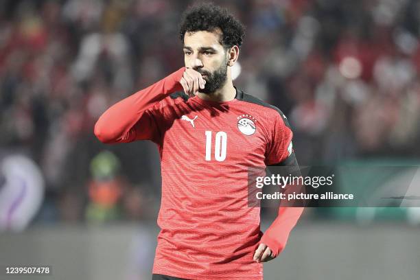 March 2022, Egypt, Cairo: Egypt's Mohamed Salah in action during the 2022 FIFA World Cup qualification third round 1st leg soccer match between Egypt...