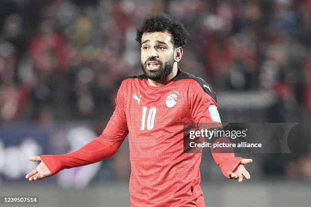 March 2022, Egypt, Cairo: Egypt's Mohamed Salah in action during the 2022 FIFA World Cup qualification third round 1st leg soccer match between Egypt...