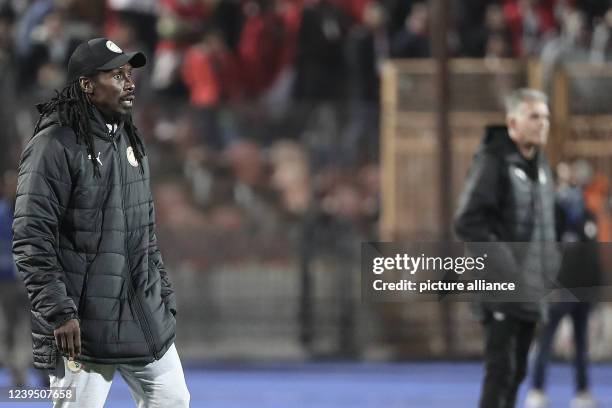 March 2022, Egypt, Cairo: Senegal coach Aliou Cisse gestures on the touchline during the 2022 FIFA World Cup qualification third round 1st leg soccer...