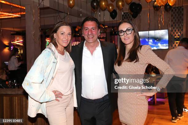 Simone Ballack, Ugo Crocamo and Melanie Crocamo during the re-opening of H'ugo's restaurant on March 25, 2022 in Gruenwald near Munich, Germany.