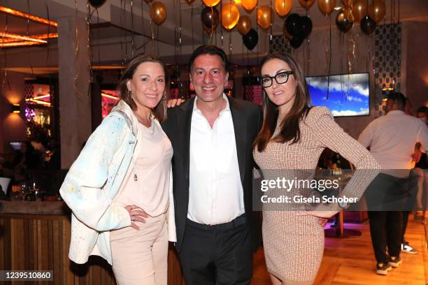 Simone Mecky-Ballack, Ugo Crocamo and Melanie Crocamo during the re-opening of H'ugo's restaurant on March 25, 2022 in Gruenwald near Munich, Germany.