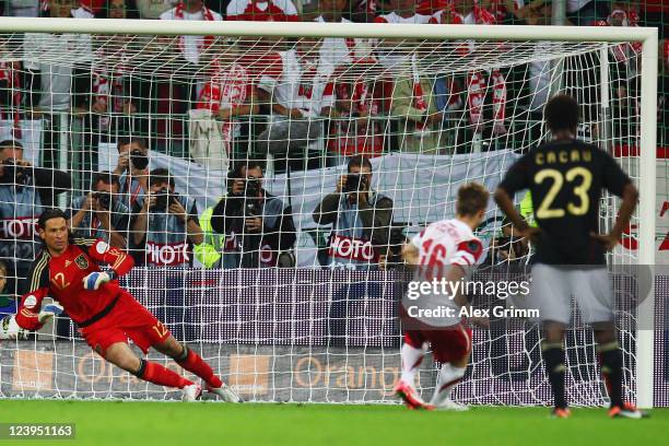 Jakub Blaszczykowski of Poland scores his team's second goal with a penalty against goalkeeper Tim Wiese of Germany during the International friendly...